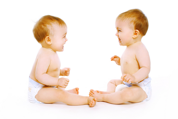 Twin babies wearing diapers
